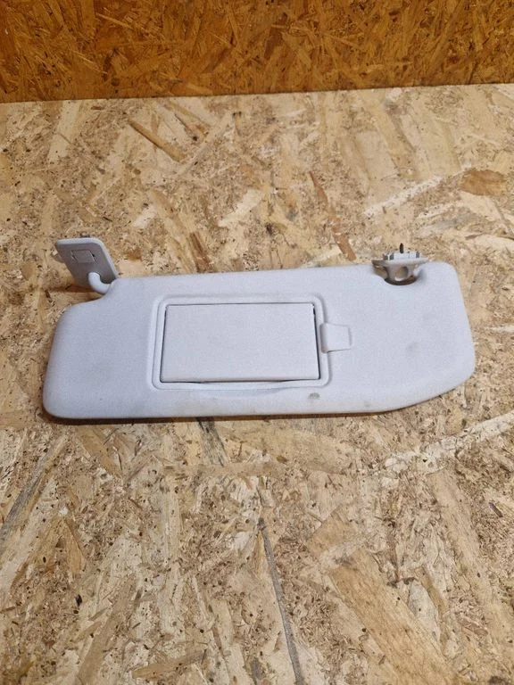 Sun visor – left