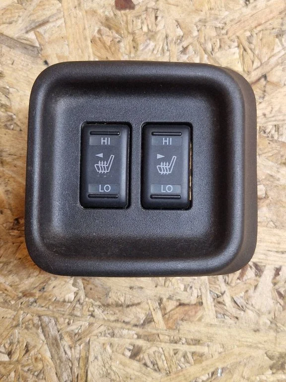 Seat heating switch