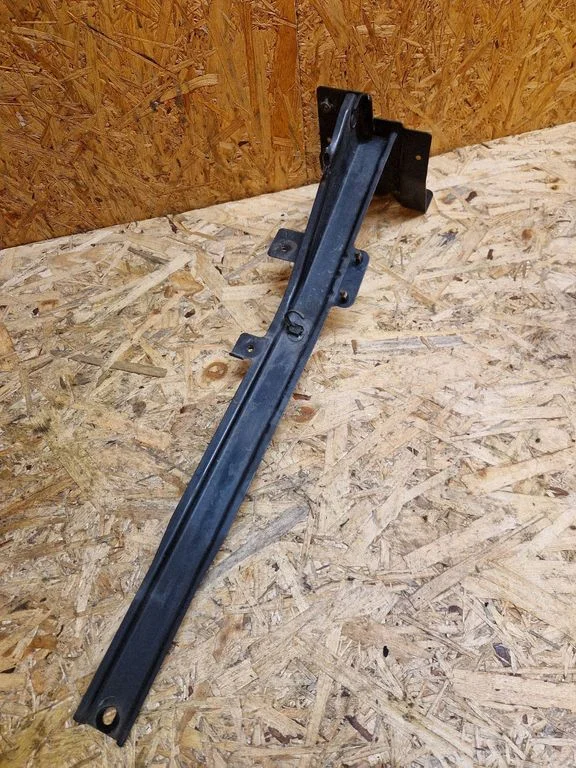 Radiator support slam panel bracket