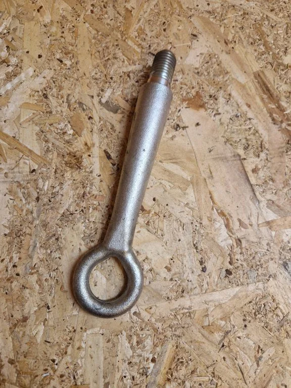Towing hook eye