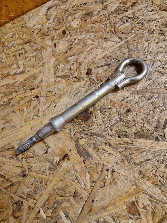 Towing hook eye