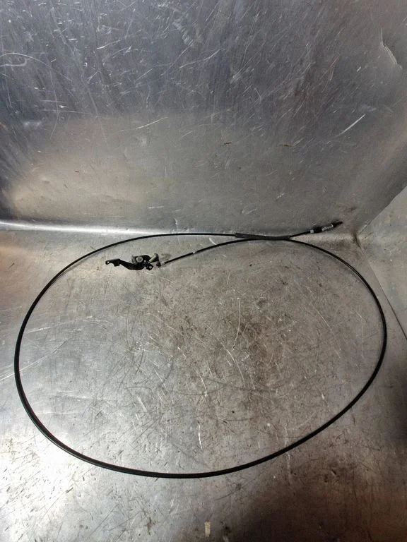Fuel cap flap release cable
