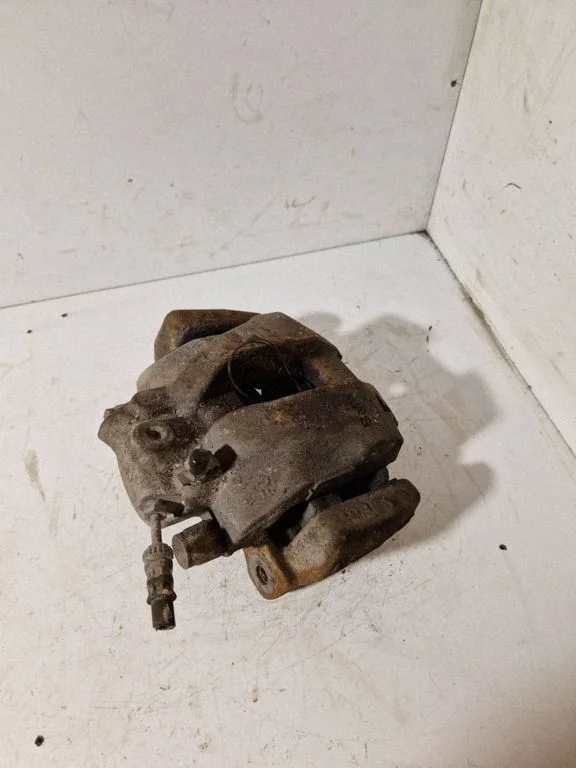 Front brake caliper 703123