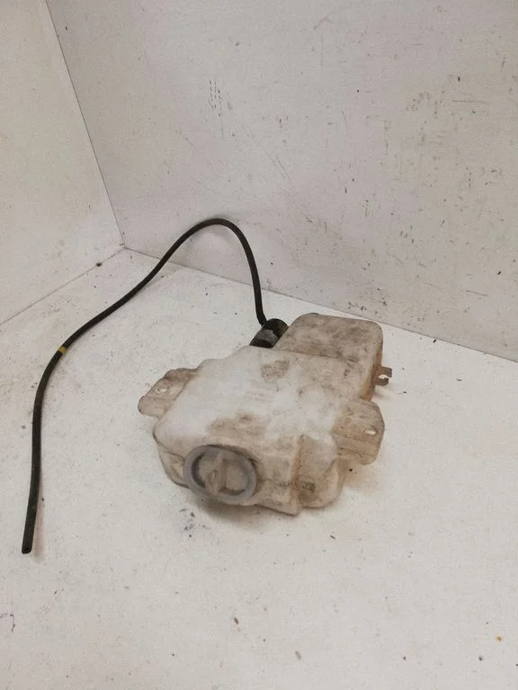 Windshield washer fluid reservoir/tank – Mitsubishi Pajero Sport I (1996-2008)