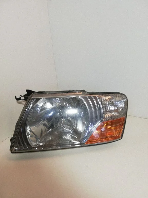 Headlight/headlamp – Mitsubishi Pajero Sport I (1996-2008)