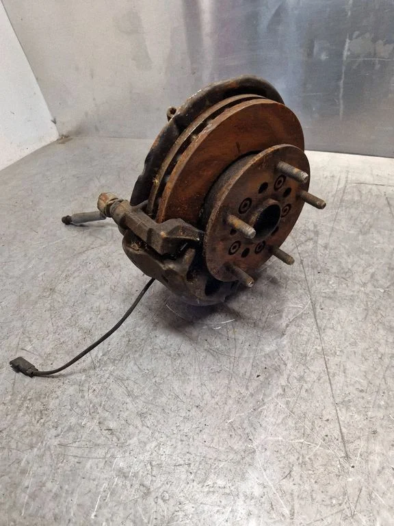 Front wheel hub spindle knuckle – right