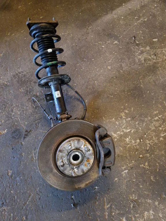 Front wheel hub spindle knuckle – right