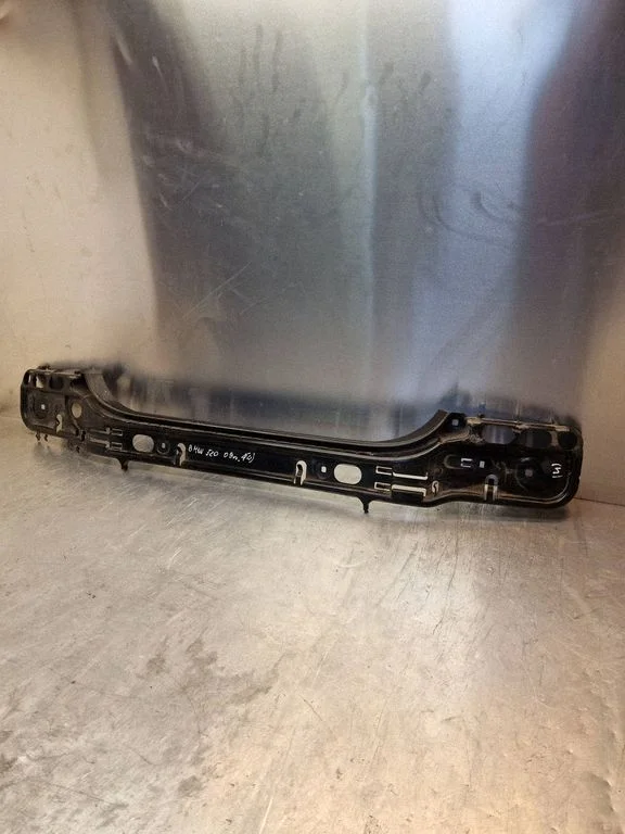 Rear bumper mounting bracket 7056343