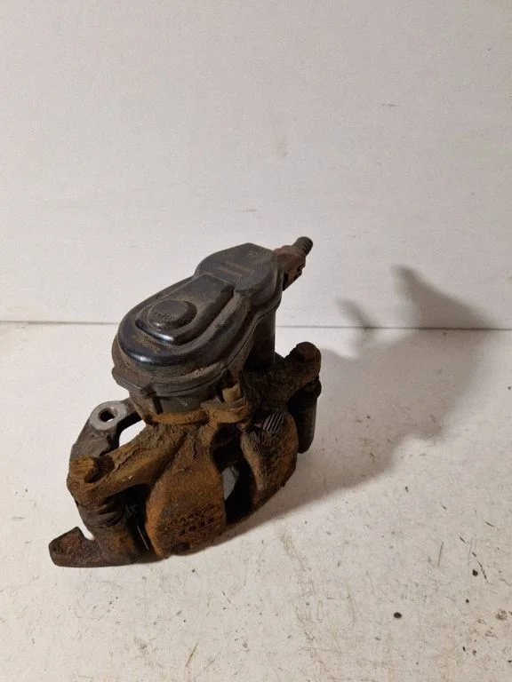 Rear brake caliper 32335478