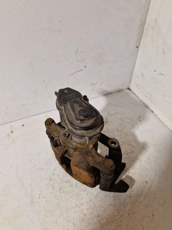 Rear brake caliper 32335478