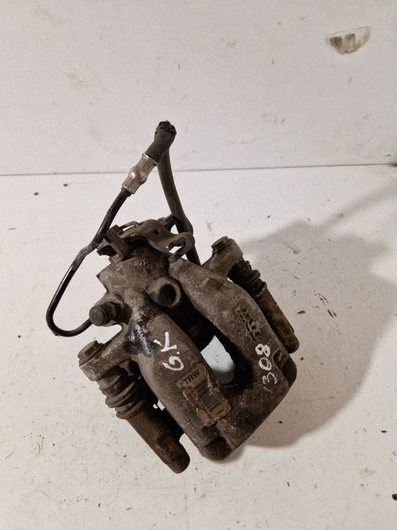 Rear brake caliper 32042595