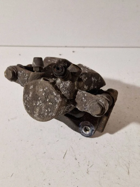 Rear brake caliper – rear left