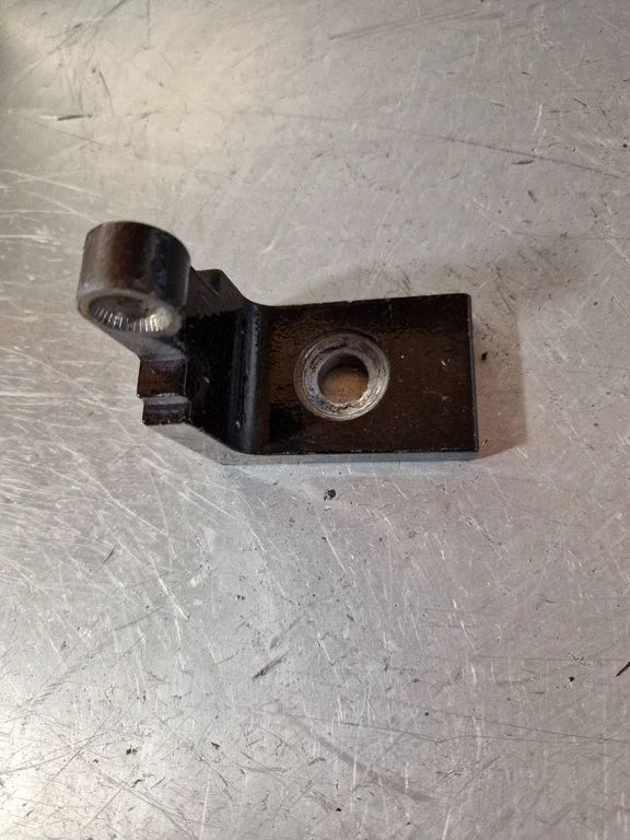 Front door upper hinge 7304993