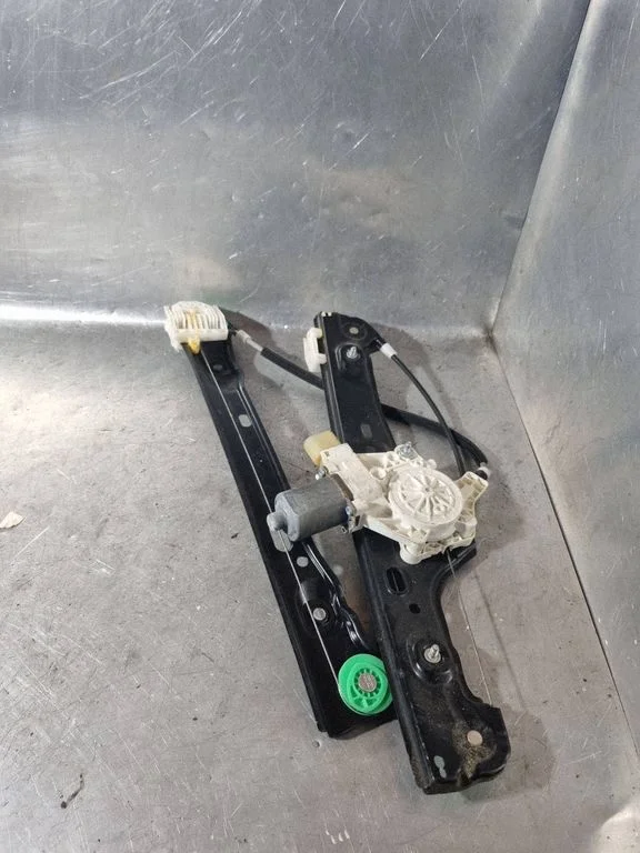 Front door window regulator with motor 6927028