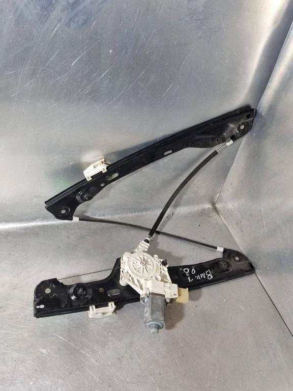 Front door window regulator with motor 7060265