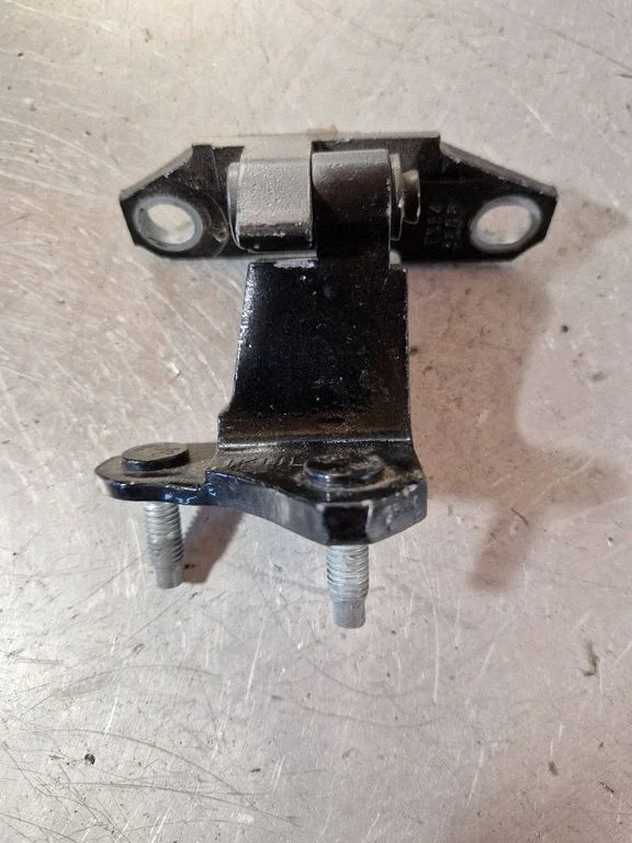 Rear door upper hinge