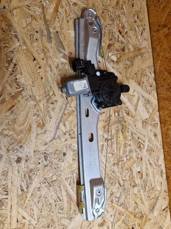 Rear door window regulator with motor 920400103
