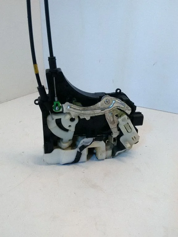 Rear door lock – left