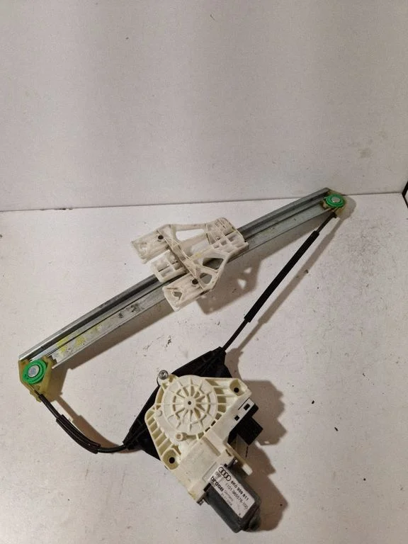 Rear door window regulator with motor 8K0959811