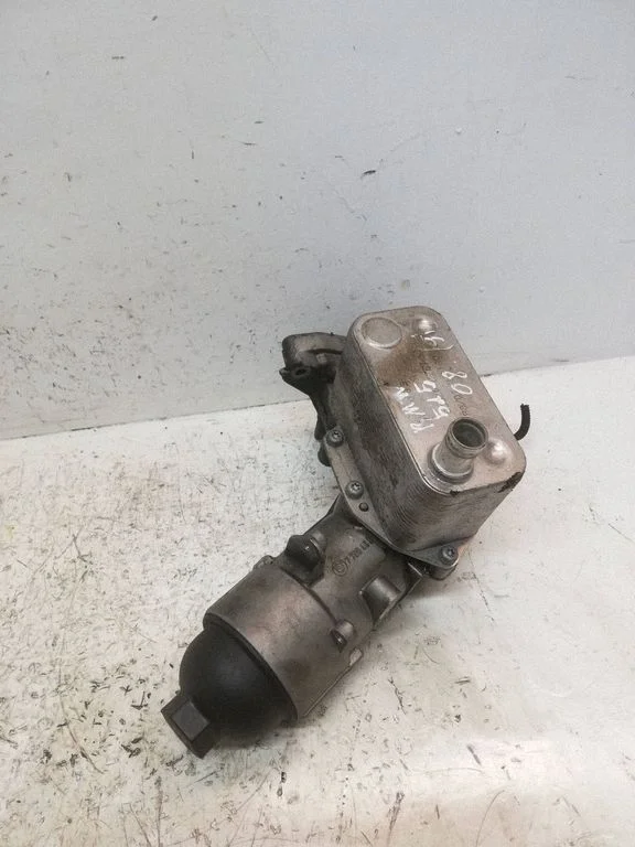Oil filter mounting bracket 7788453