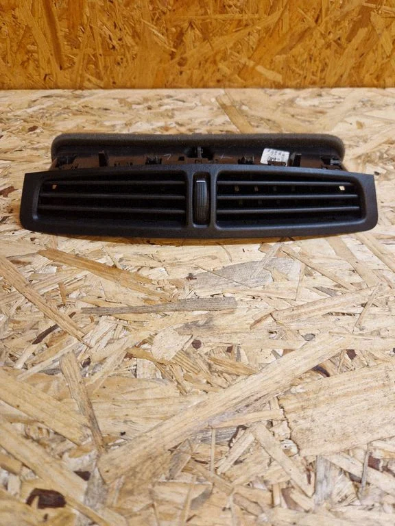 Dash center air vent grill AM51101815ACW