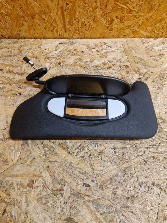 Sun visor – left