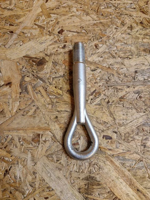 Towing hook eye
