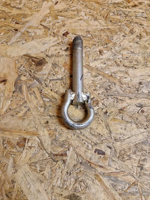 Towing hook eye