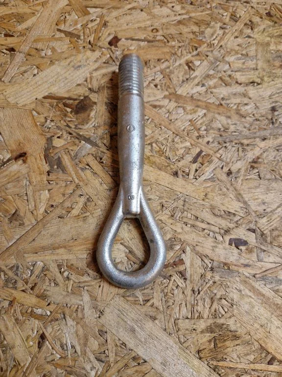 Towing hook eye