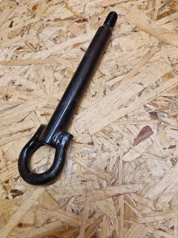 Towing hook eye