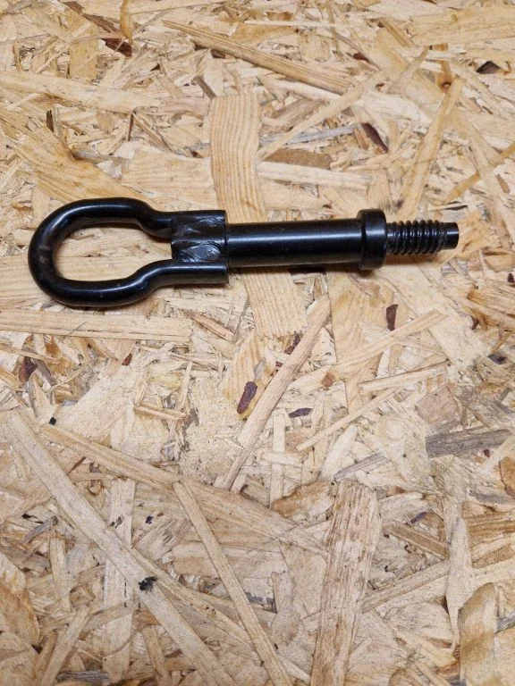 Towing hook eye