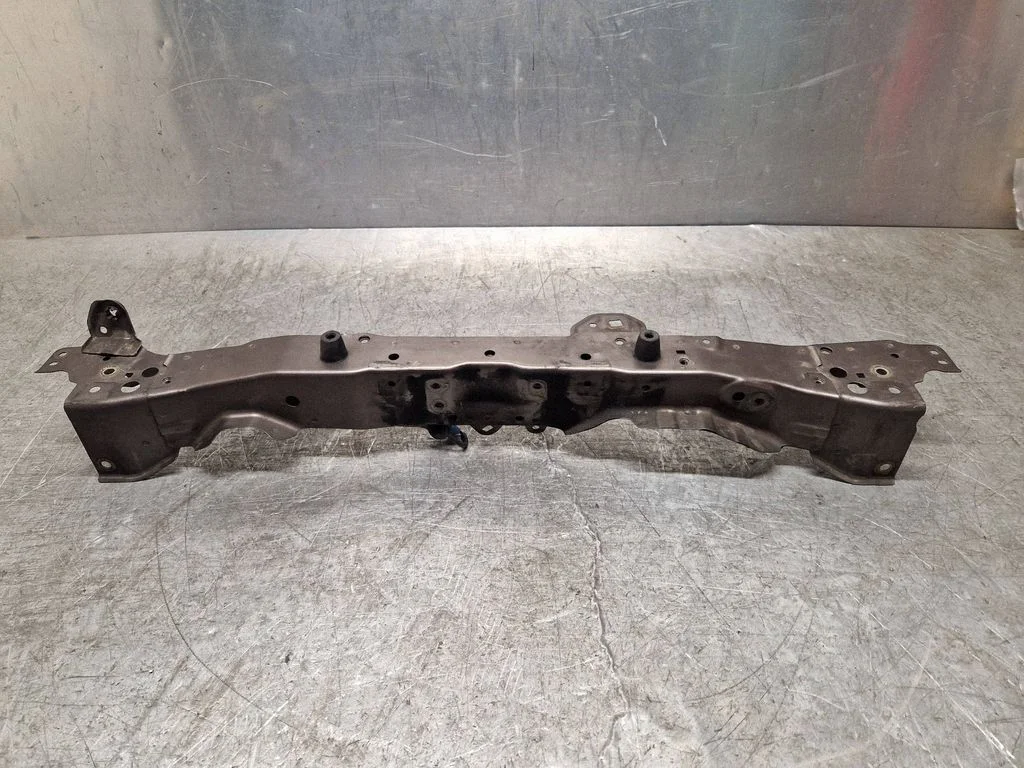 Top upper radiator support slam panel