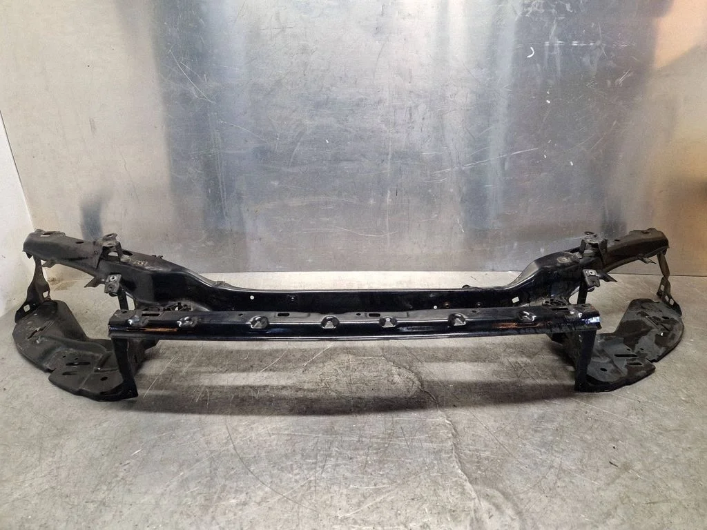Top upper radiator support slam panel