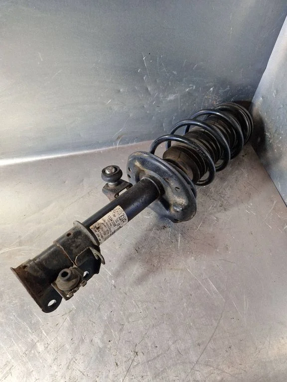 Front shock absorber with coil spring – Opel Corsa D (2006-2014)