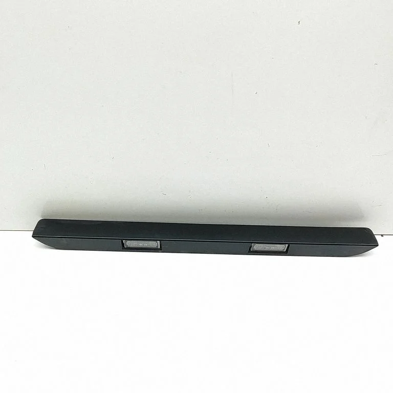 Trunk door license plate light bar 1307272070