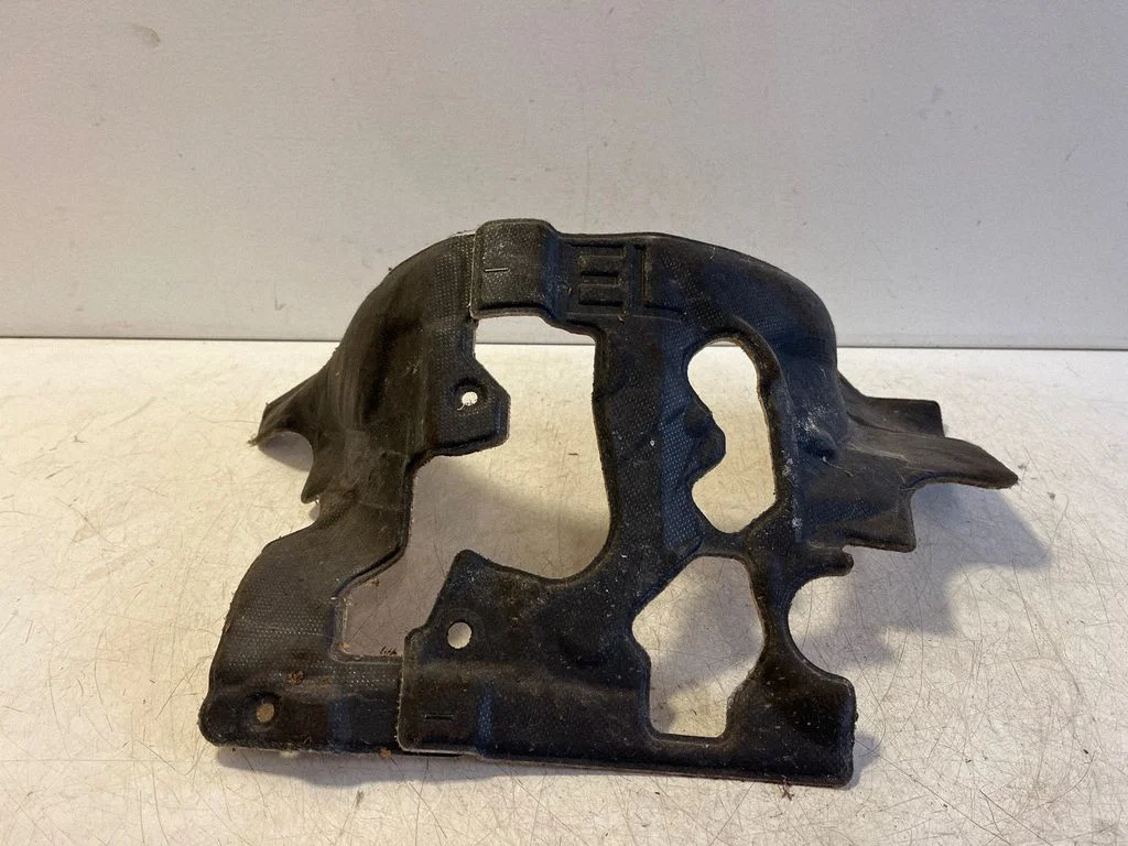 Other engine bay part – left