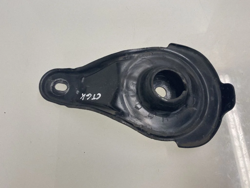 Front coil spring rubber mount