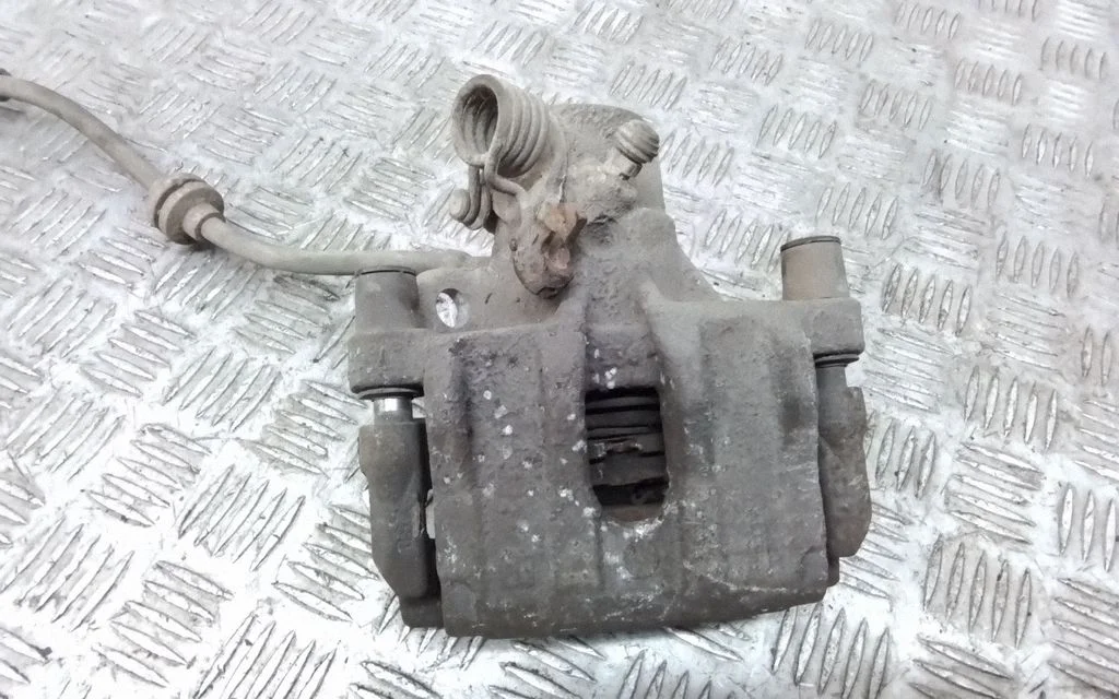 Rear brake caliper – rear left