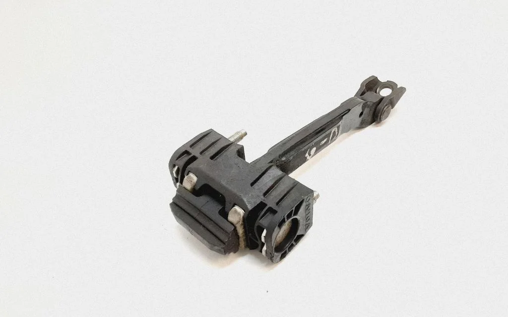 Rear door check strap stopper – Volvo V60 (2011-2013)