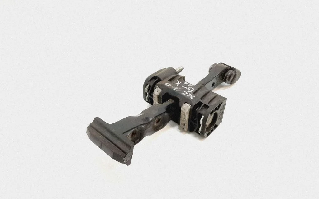 Rear door check strap stopper – Volvo XC70 (2008-2013)