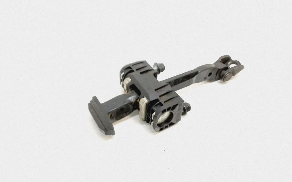 Rear door check strap stopper – Volvo XC60 (2009-2013)