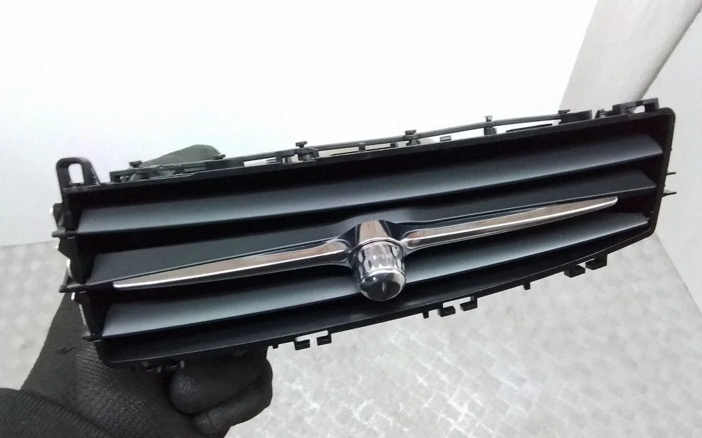 Dash center air vent grill 31366589