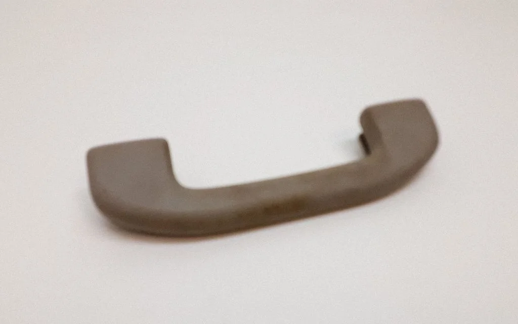 Front interior roof grab handle