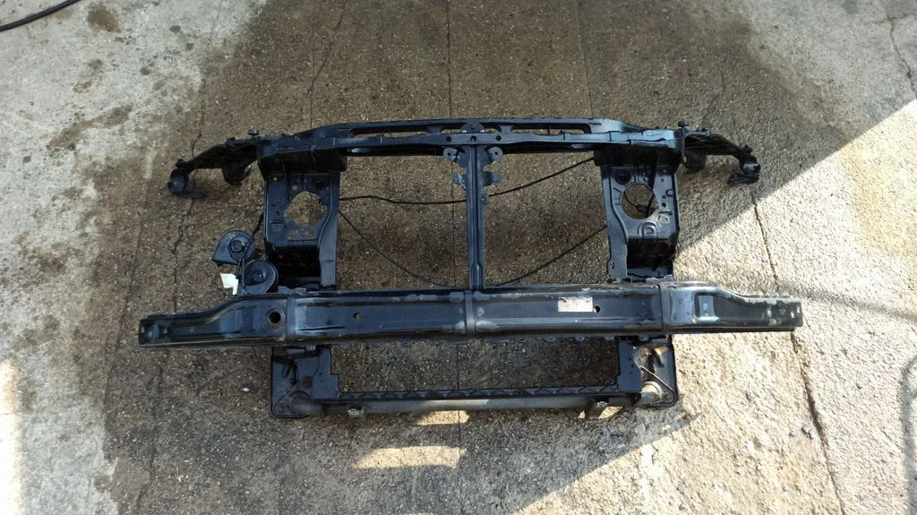Radiator support slam panel – front