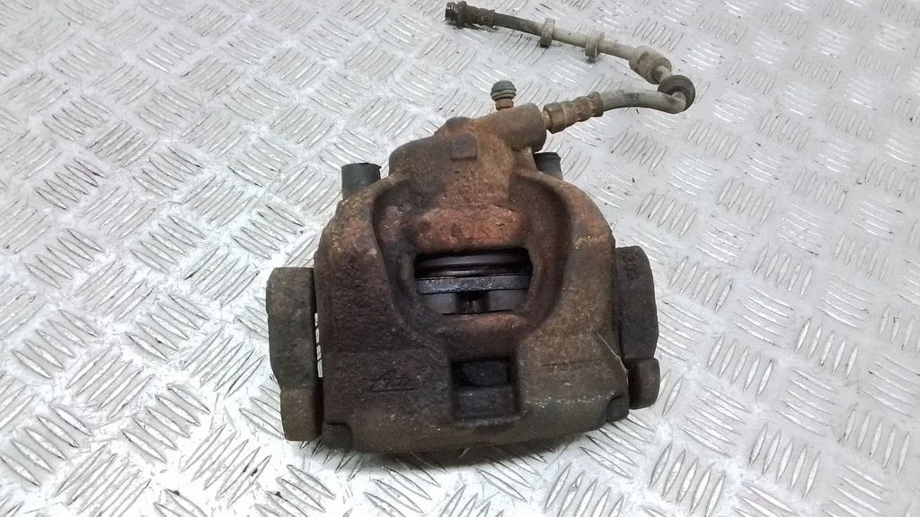 Front brake caliper – front left