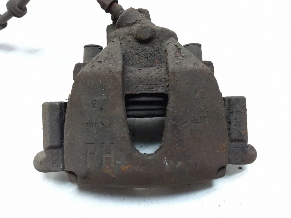 Front brake caliper – right