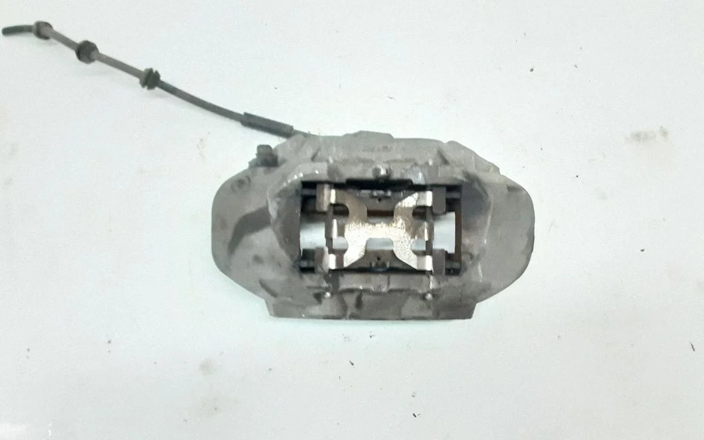 Front brake caliper – front left