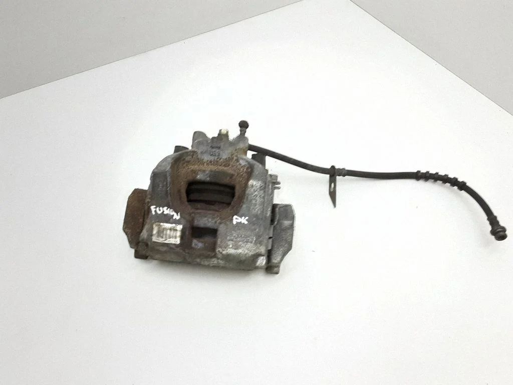 Front brake caliper DG9C2011AB