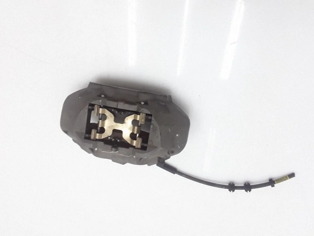 Front brake caliper – front left