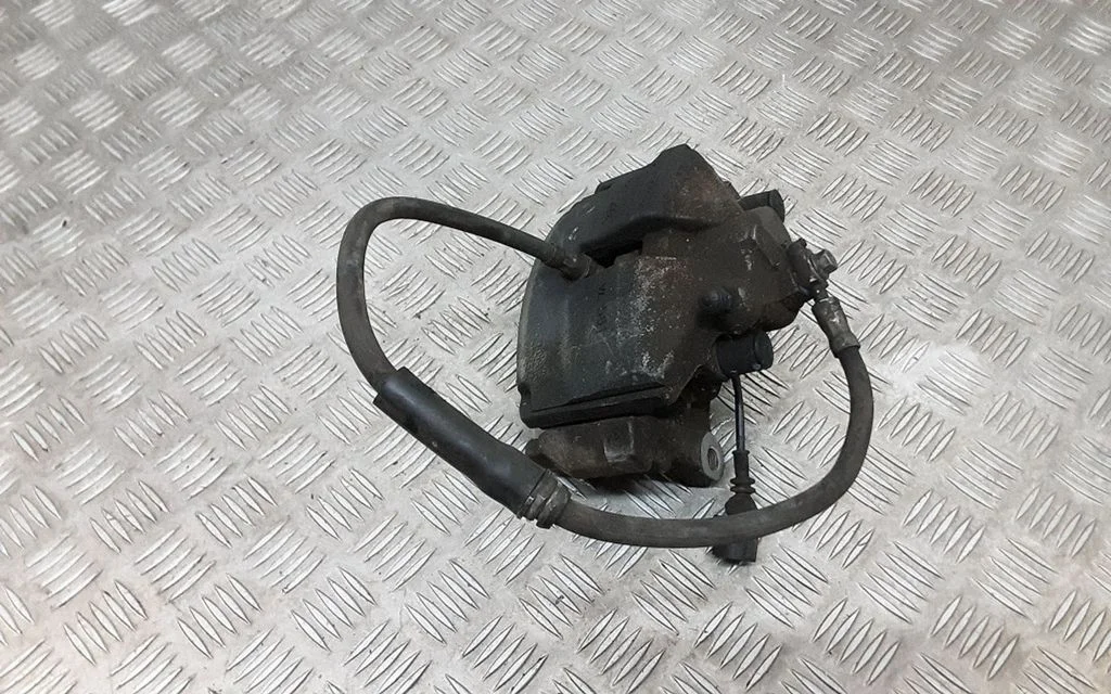 Front brake caliper VL581